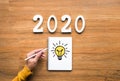 2020 creativity inspiration concepts with lightbulb on notepaper