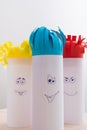 Creativity paper handmade for children. Funny faces on tubes with colorful hair