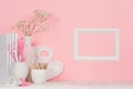 Creativity school background for girl`s - white stationery, palette, pencils and blank photo frame on soft pink wall, white wood. Royalty Free Stock Photo