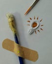 creativity symbol, broken pencil, paintbrush, photo creativity development ideas