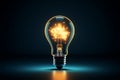 Creativity takes shape as a light bulb outline on a dark backdrop