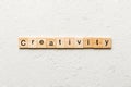 creativity word written on wood block. creativity text on cement table for your desing, concept Royalty Free Stock Photo