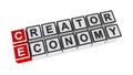 Creator economy word block on white