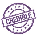 CREDIBLE text written on purple violet vintage stamp Royalty Free Stock Photo