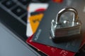 Credit bank cards with a lock on the keyboard. Online shopping, online security. Hacking a bank account Royalty Free Stock Photo