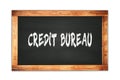 CREDIT BUREAU text written on wooden frame school blackboard