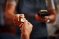 Credit card, cashier and man hands with payment machine in a restaurant with customer service. Employee hand, male Royalty Free Stock Photo