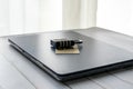 A credit card with a combination padlock placed on a closed laptop, symbolizing data security, financial protection Royalty Free Stock Photo
