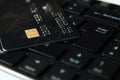 Credit card on a computer keyboard, close-up. Internet purchase Royalty Free Stock Photo