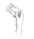 Credit card in a female hand. Sketch hand drawn. Female hand holding bank card. Hatched drawing picture. Gray pencil