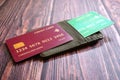 Credit card and holder on a wooden table. Royalty Free Stock Photo