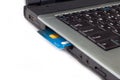 Credit card inserted in laptop