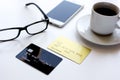 Credit card, keyboard, smartphone and coffee cup on white background Royalty Free Stock Photo