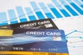 Credit card model on chart and graph spreadsheet paper Royalty Free Stock Photo