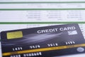 Credit card model on chart and graph spreadsheet paper. Royalty Free Stock Photo