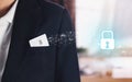 Credit card in pocket businessman black suit and icon key lock. Cyber Security. Royalty Free Stock Photo