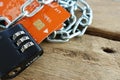 Credit card security concept with chain and lock on wooden table Royalty Free Stock Photo