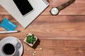 Credit card, watch, smartphone and coffee cup on wooden table Royalty Free Stock Photo