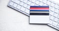 Credit cards on the computer keyboard Royalty Free Stock Photo