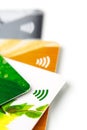 Credit cards with contactless payment. Pile of credit cards on white isolated background Royalty Free Stock Photo