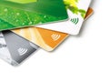 Credit cards with contactless payment. Pile of credit cards on white isolated background Royalty Free Stock Photo