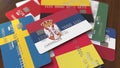 Many credit cards with different flags, emphasized bank card with flag of Serbia. 3D rendering