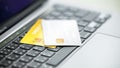 Credit cards on the laptop keyboard. Open access for online shopping, Credit card close up shot with selective focus, Concept of Royalty Free Stock Photo