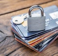 Credit cards and simle mechanical lock Royalty Free Stock Photo