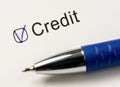 Credit checkbox on white paper with pen. check mark in checkbox and word credit. financial loan application form for lender and