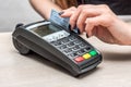 Credit or debit card password payment. Customer hand is entering personal identification number in shop or supermarket Royalty Free Stock Photo