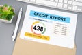 The Credit score report document and pen with computer keyboard on the desk Royalty Free Stock Photo