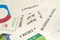 Credit score, report, rating and contract on the table