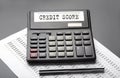 CREDIT SCORE word on the calculator on the chart with pen Royalty Free Stock Photo
