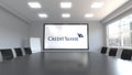 Credit Suisse Group logo on the screen in a meeting room. Editorial 3D rendering