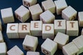 Credit, trust that allow people to provide money or debt for lending concept, cube wooden block with alphabet combine the word Royalty Free Stock Photo