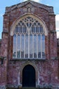 Crediton Parish Church of the Holy Cross and the Mother of Him Who Hung thereon as seen from back entrance with stained glass,