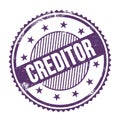 CREDITOR text written on purple indigo grungy round stamp