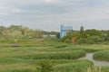 Polder landscape with watertower, house and sluice in Antwerp