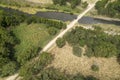 Creek And Road Through Green Country Landscape Royalty Free Stock Photo