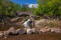 Amity Creek Waterfall and Stone Arch Bridge Royalty Free Stock Photo