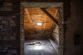 Creepy attic interior at abandoned building