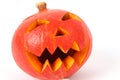 Creepy carved pumpkin face with white background Royalty Free Stock Photo