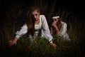 Creepy dead bride at night in a swamp. Bride girls at night. Halloween scene