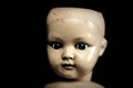 Creepy doll in the dark Royalty Free Stock Photo