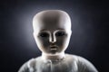 Creepy doll face on dark background Royalty Free Stock Photo