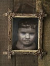 Creepy Halloween Framed Doll Royalty Free Stock Photo