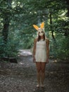 Creepy halloween portrait. Blonde woman in halloween costume.