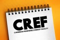 CREF - Caribbean Renewable Energy Facility acronym text on notepad, abbreviation concept background