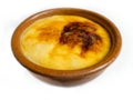 Crema Catalana or Creme Brulee in rustic bowl. Traditional dessert in France and Catalonia. Royalty Free Stock Photo