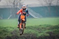 Crema, Italy Ã¢â¬â 12/2022: Motocross bike performing stunts on training track